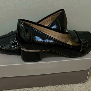 Black Franco Sarto patent leather heeled loafers.  Good condition
